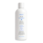 Mille Citrus Bloom shampoo and conditioner bottle on a white background