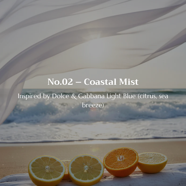Oranges and lemons on a sandy beach with ocean waves and a white fabric in the background, labeled 'No.02 - Coastal Mist'.